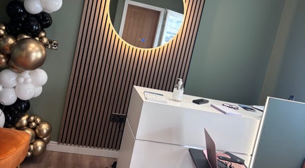 Reception at Natalie Mcintyre Aesthetics, Bishopbriggs, Scotland with modern decor and inviting ambiance.