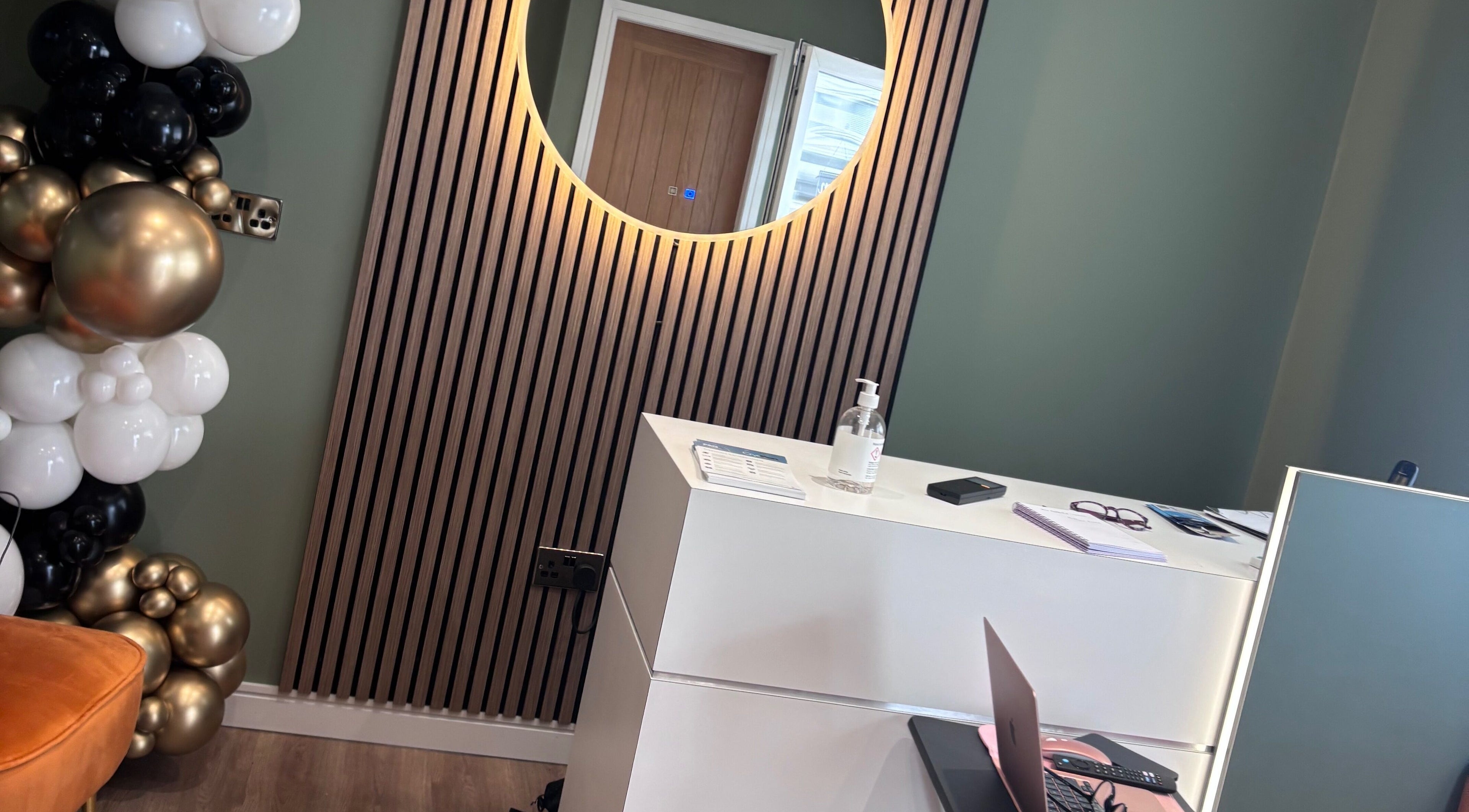 Reception at Natalie Mcintyre Aesthetics, Bishopbriggs, Scotland with modern decor and inviting ambiance.