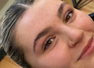 Close-up of a radiant face with natural makeup by Caitlin Marie Makeup in Arklow, County Wicklow, IE.