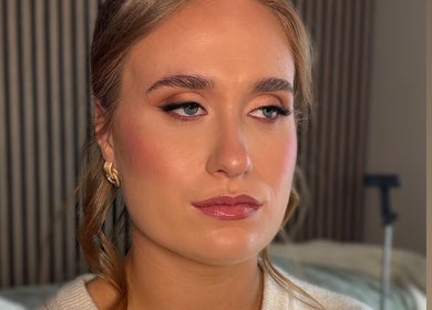 Elegant woman with flawless makeup by Caitlin Marie Makeup in Arklow, County Wicklow, IE.