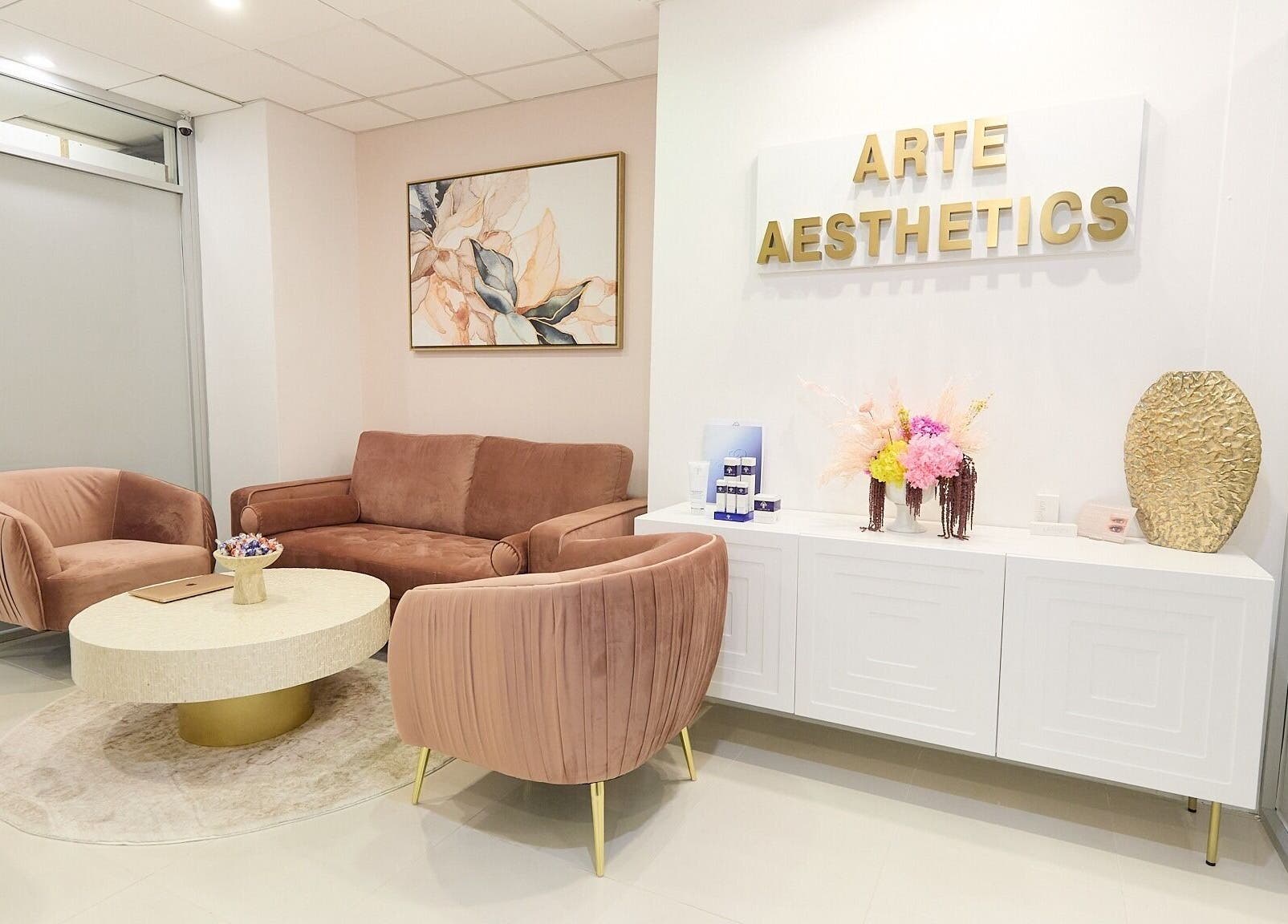 Elegant lounge at Arte Aesthetics, Sydney, New South Wales, AU, featuring plush seating and tasteful decor.