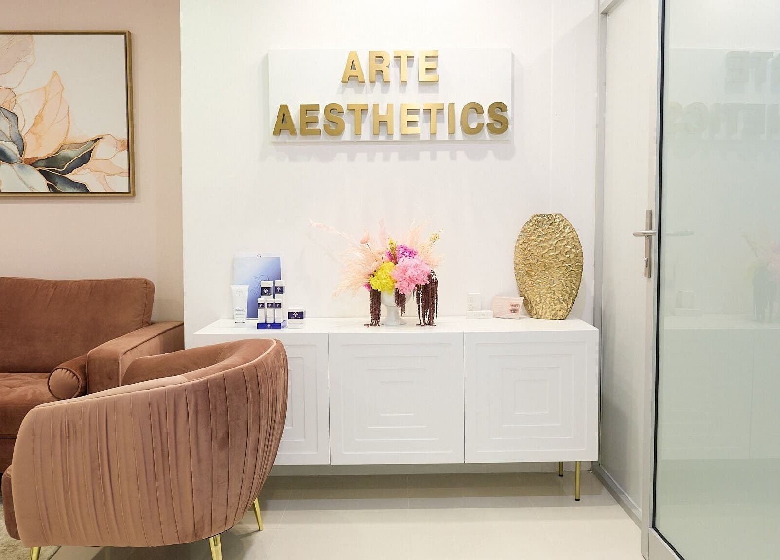 Elegant reception at Arte Aesthetics, Sydney, New South Wales, AU featuring plush seating and decor.