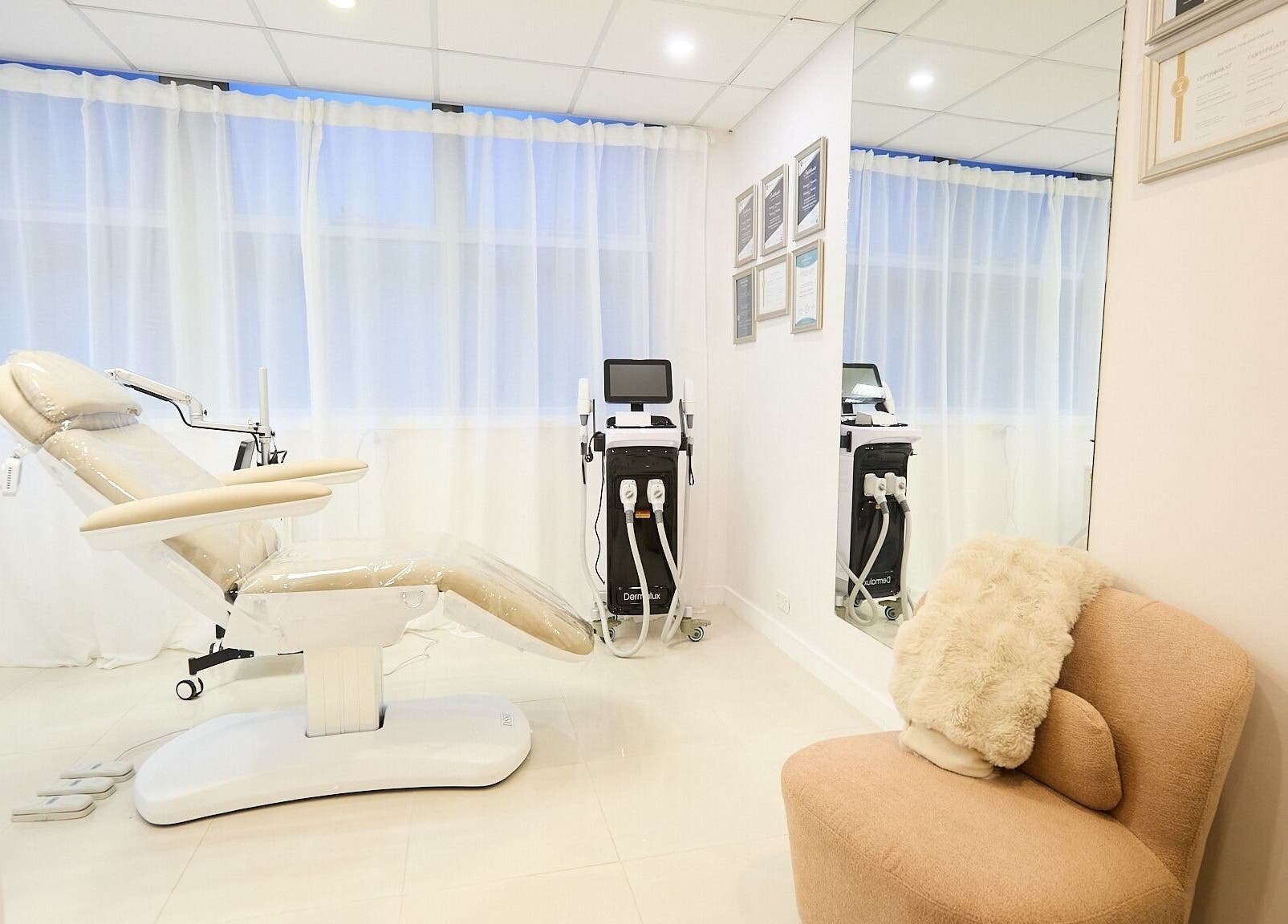 Elegant treatment room at Arte Aesthetics, Sydney, New South Wales, AU with a plush chair and state-of-the-art equipment.