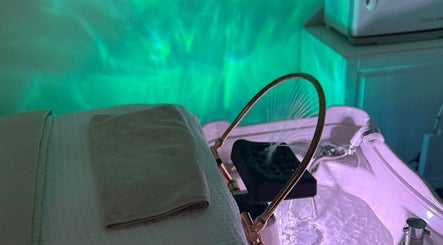 Relaxing spa suite at Radiant Skin Clinic, Peterborough, England, GB, with calming light effects.