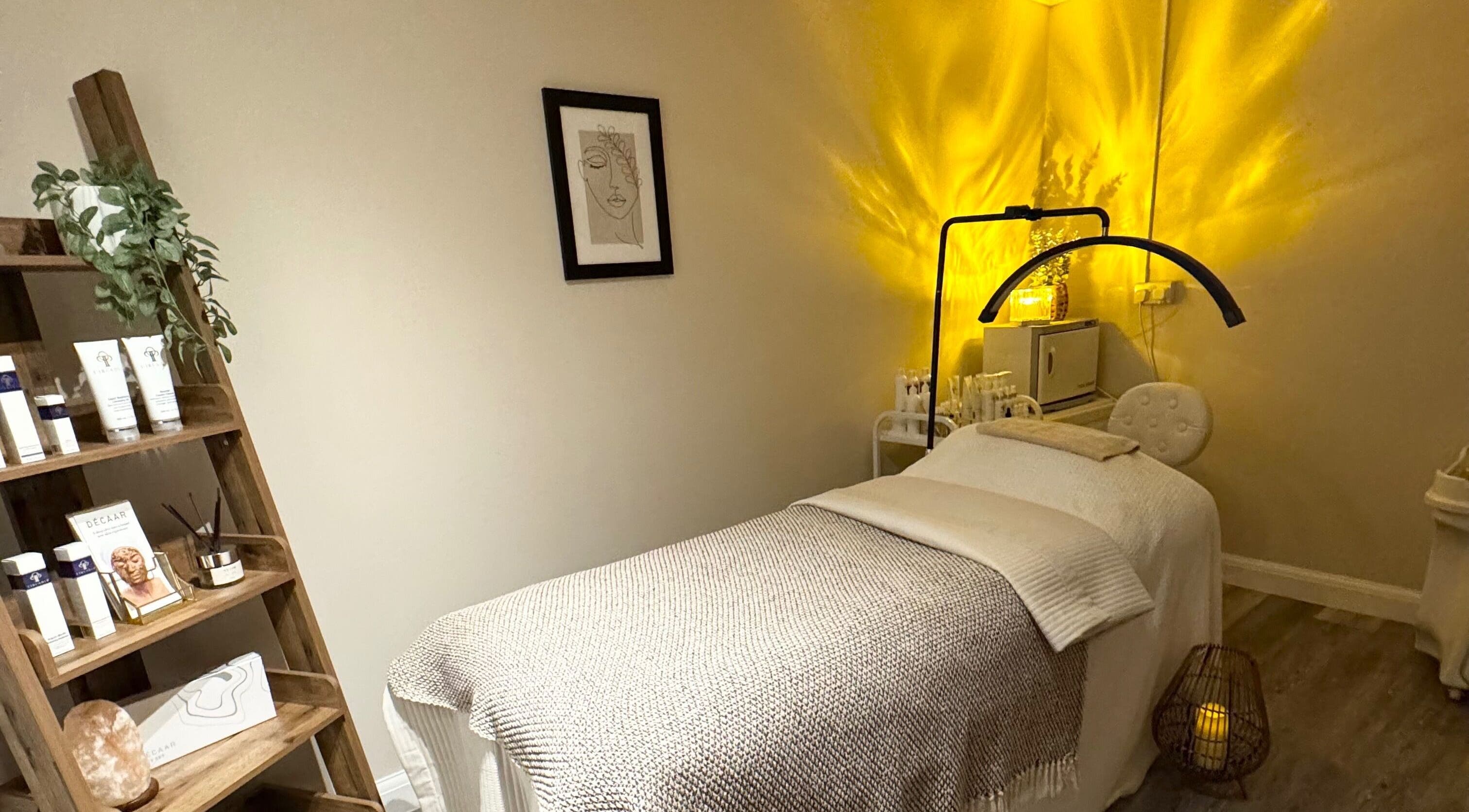 Serene spa room at Radiant Skin Clinic, Peterborough, England, GB with a cozy treatment bed.