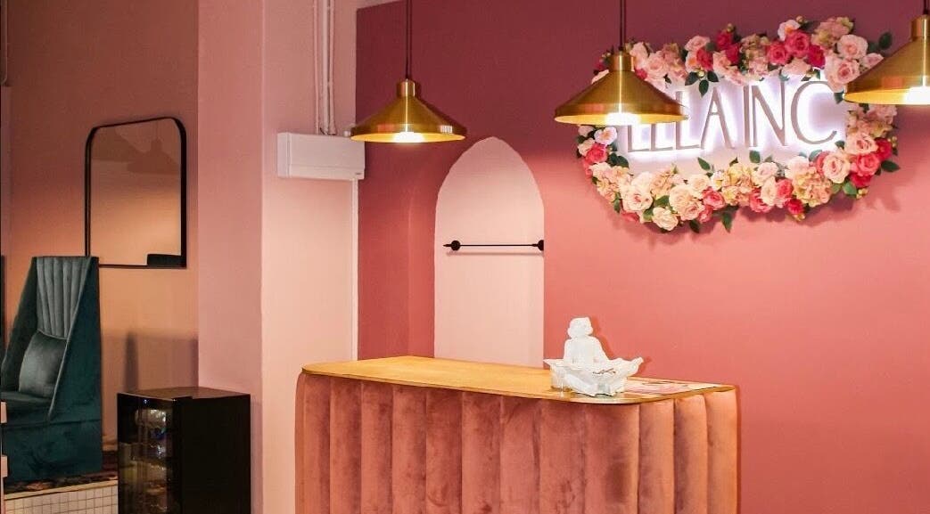 Stylish interior of Ellainc Beauty Nail Bar in Cape Town, Western Cape, ZA, featuring elegant floral accents.