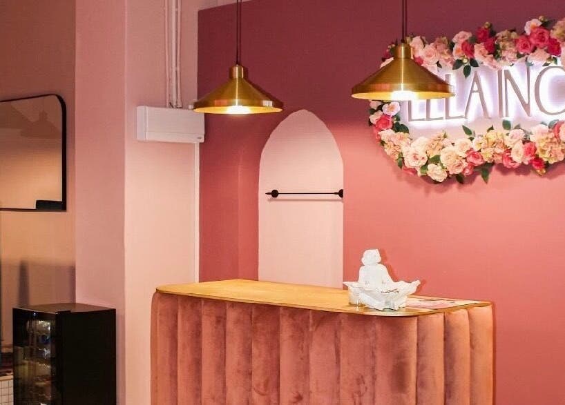 Elegant reception area of Ellainc Beauty Nail Bar in Cape Town, Western Cape, ZA, featuring floral decor.
