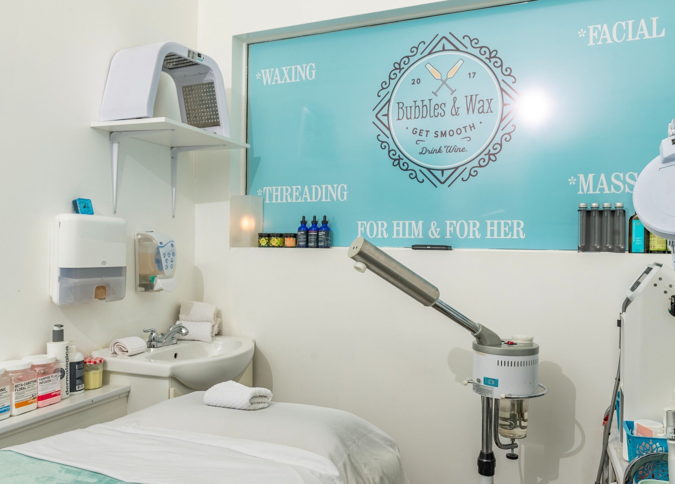 Bubbles and Wax Bar's peaceful treatment room in Surrey, British Columbia, CA, featuring spa essentials.