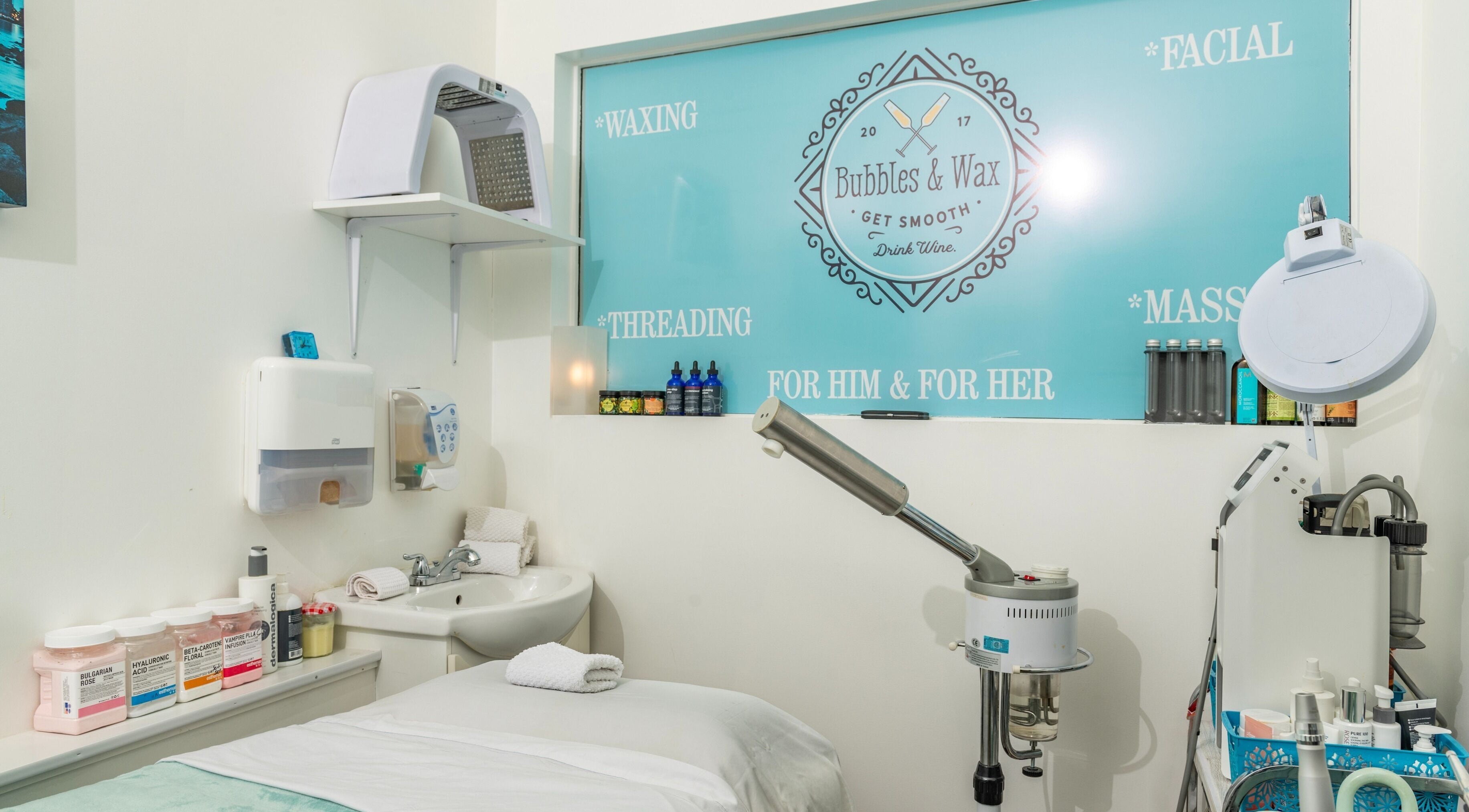 Bubbles and Wax Bar's peaceful treatment room in Surrey, British Columbia, CA, featuring spa essentials.