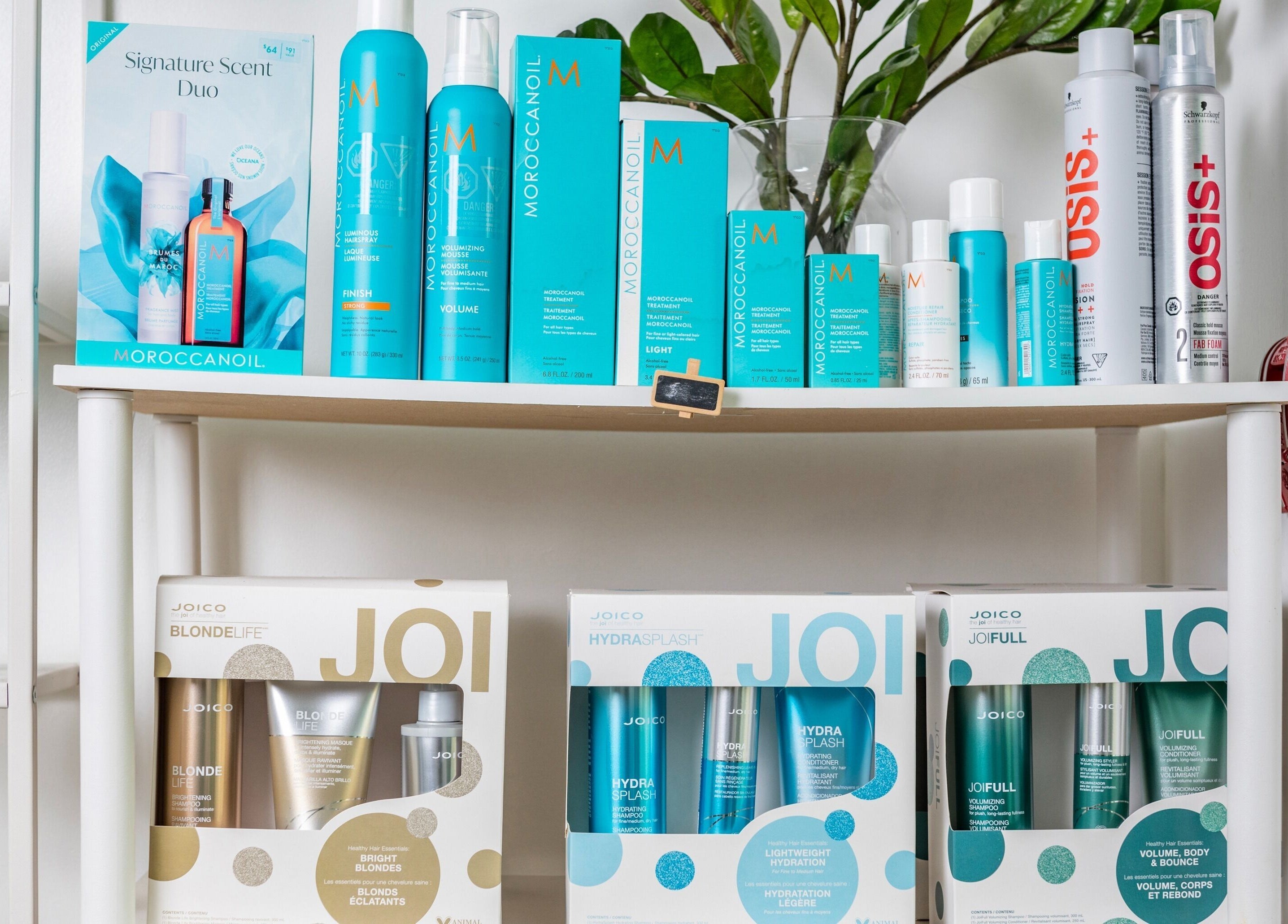 Diverse hair care products at Bubbles and Wax Bar in Surrey, British Columbia, CA, showcasing premium brands.