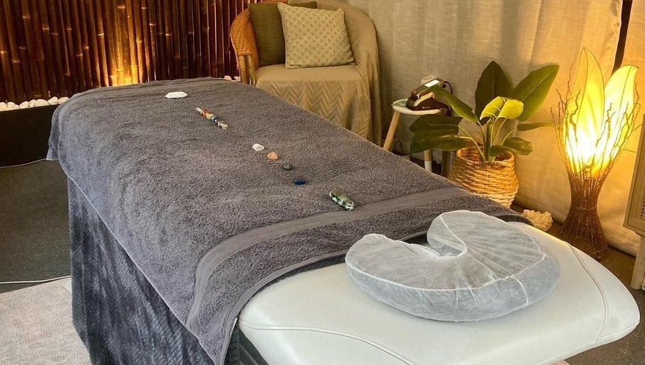 Tranquil massage room at Synergy Fitness and Wellbeing, Melbourne, Victoria, AU with a relaxing setup.