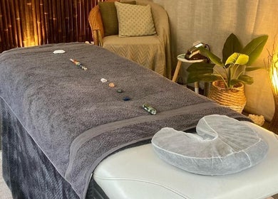 Tranquil massage room at Synergy Fitness and Wellbeing, Melbourne, Victoria, AU with a relaxing setup.