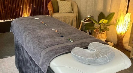 Tranquil massage room at Synergy Fitness and Wellbeing, Melbourne, Victoria, AU with a relaxing setup.