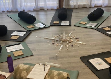 Yoga mats and crystals at Synergy Fitness and Wellbeing, Melbourne, Victoria, AU set for a wellness session.