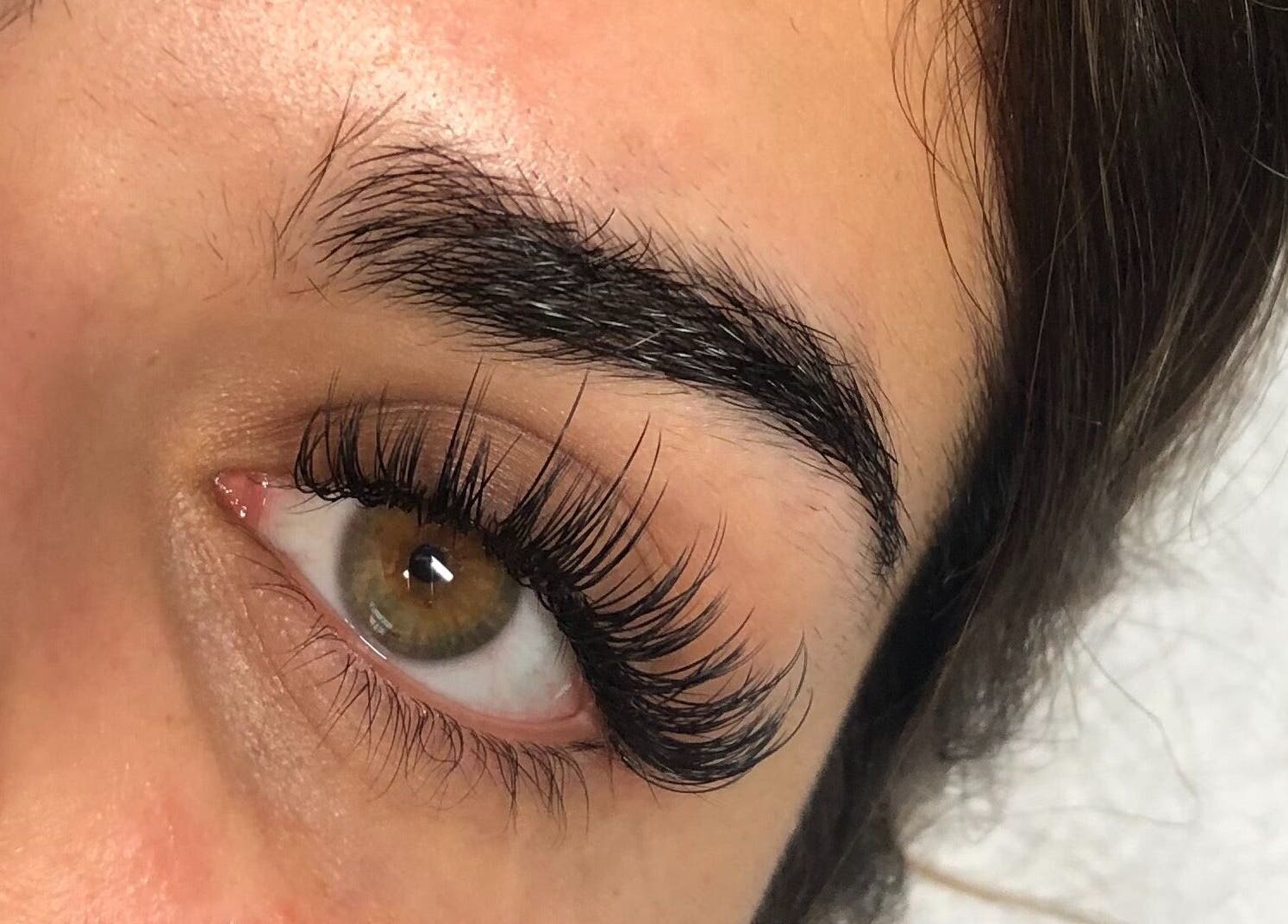 Close-up of expertly applied eyelash extensions at PRF London | JazLooks, Wembley, England, GB.