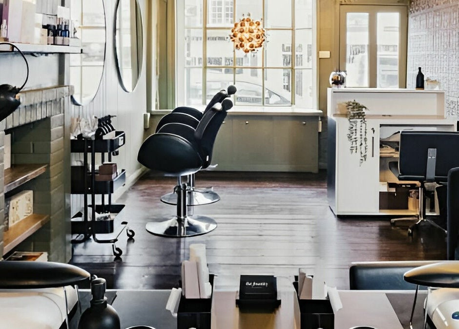 Elegant salon interior at The Foundry, Cranbrook, England, GB, featuring modern styling chairs and decor.