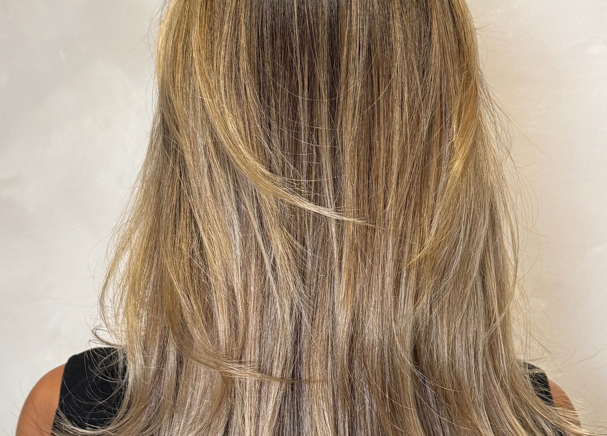 Lustrous blonde hair styled at CAZA STUDIO, Mont-royal, Québec, CA. Perfect blend of highlights and lowlights.
