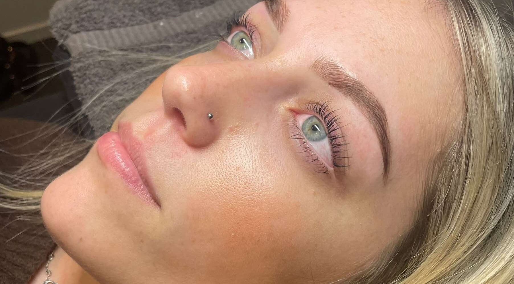 Close-up of a woman's fresh complexion post-treatment at Mason & May, Christchurch, Canterbury, NZ.