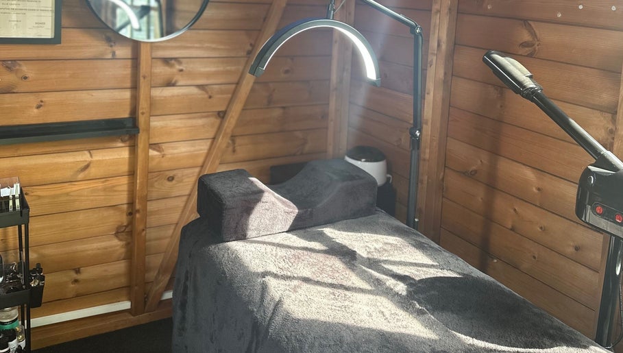 Tranquil therapy bed at The Beauty Lounge, Wigston, England, GB with ambient lighting.