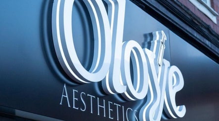 The Beauty Lounge - Wednesdays Only sign glows in Leicester, England, GB.