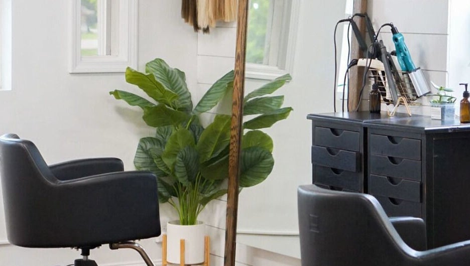 Modern salon workstation at Kyana Britner with Texture+Sage, Fremont, Ohio, US. Features styling chair and mirror.