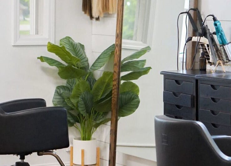 Modern salon workstation at Kyana Britner with Texture+Sage, Fremont, Ohio, US. Features styling chair and mirror.