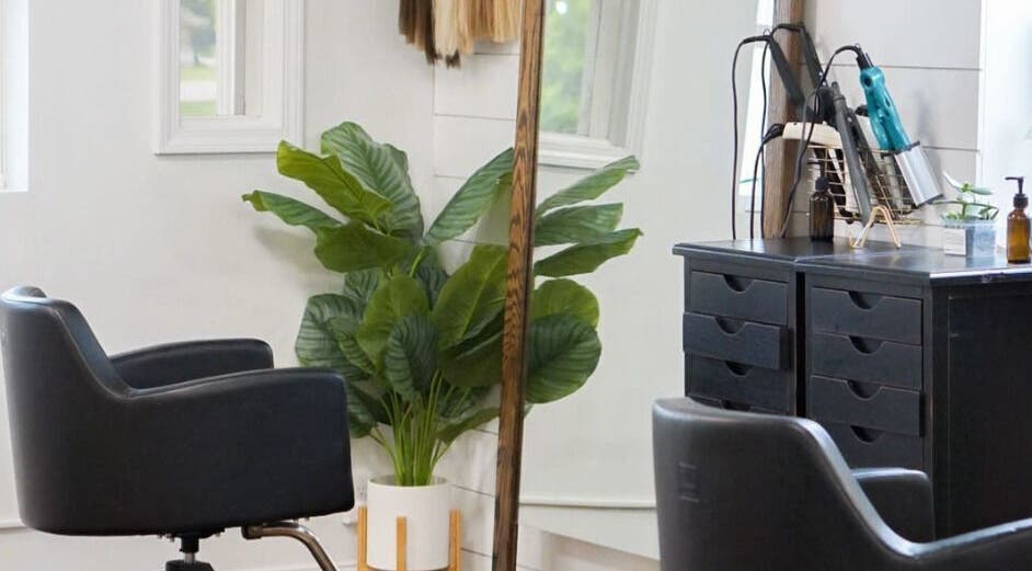 Modern salon workstation at Kyana Britner with Texture+Sage, Fremont, Ohio, US. Features styling chair and mirror.