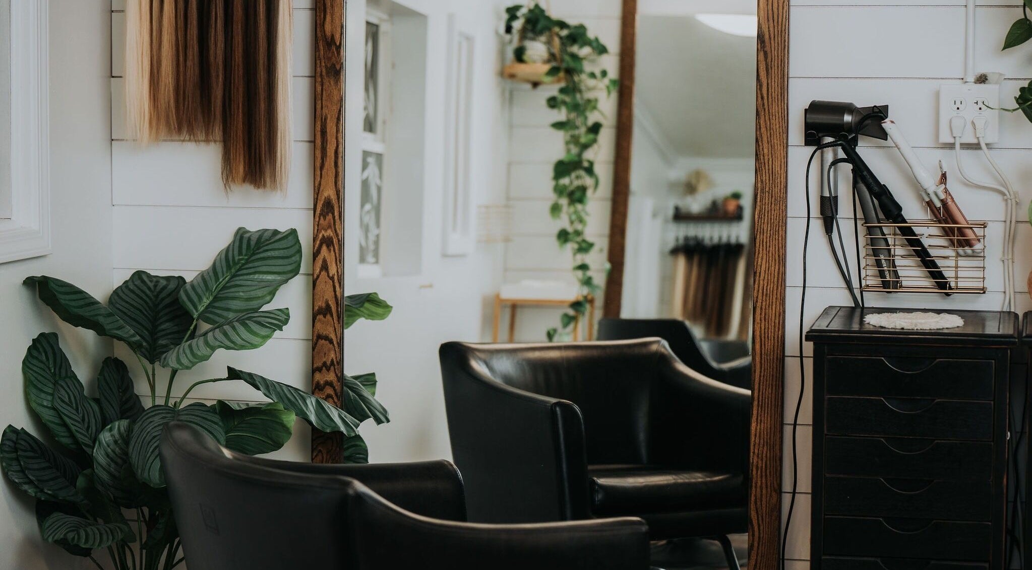 Elegant salon interior at Kyana Britner with Texture+Sage in Fremont, Ohio, US featuring stylish equipment.