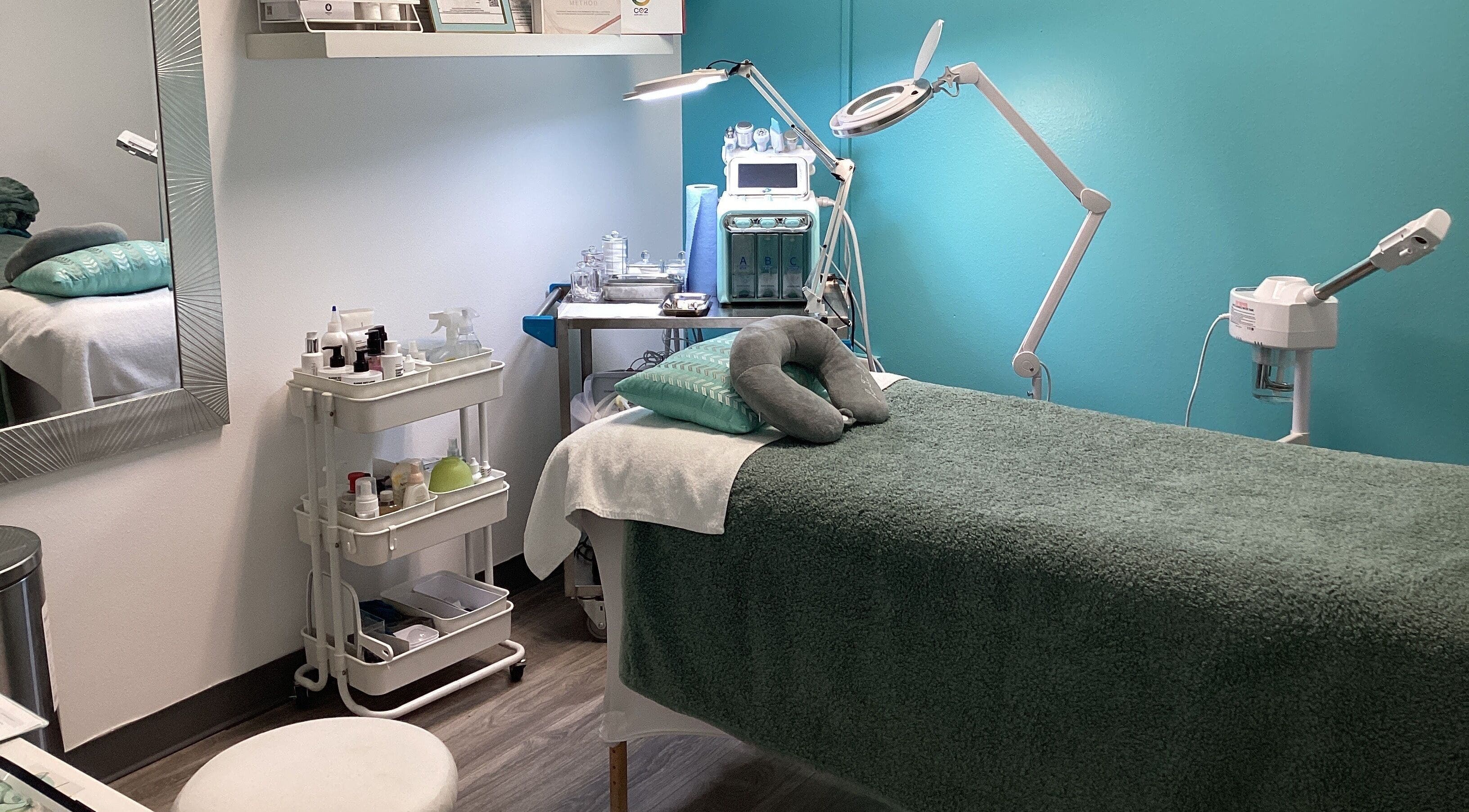 Cozy treatment room at Magic Body Aesthetic, Winter Garden, Florida, US featuring modern equipment and soothing decor.