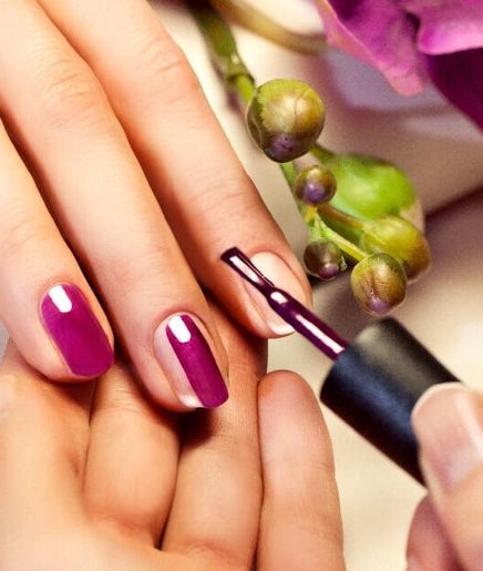 Manicured hands with vibrant nails at Q T NAILS, Santa Clara, California, US.