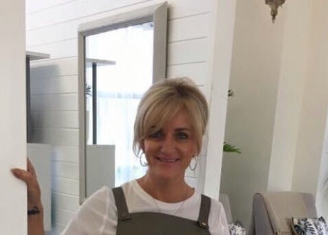 Jan Kelly welcomes clients at Jan’s Beauty Hub, Hope Island, Queensland, AU, offering a cozy and inviting space.