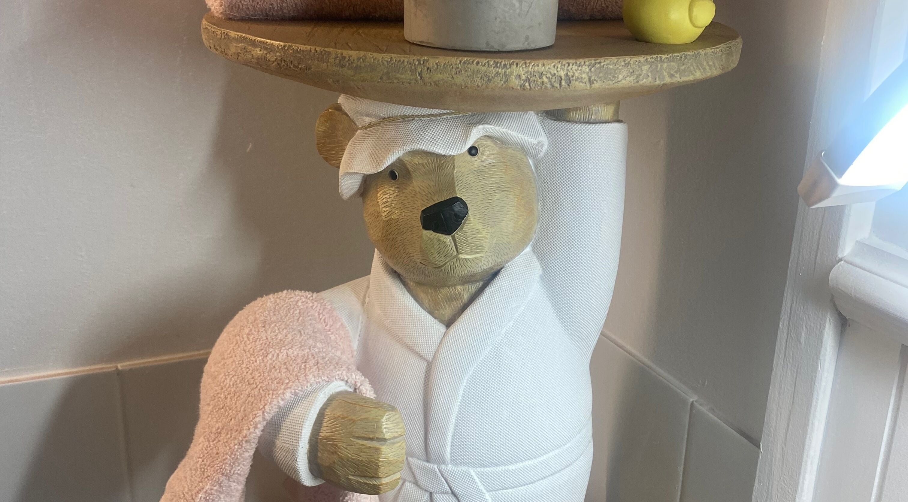 Charming spa bear in robe at Jan Kelly's Beauty Hub, Hope Island, Queensland, AU.