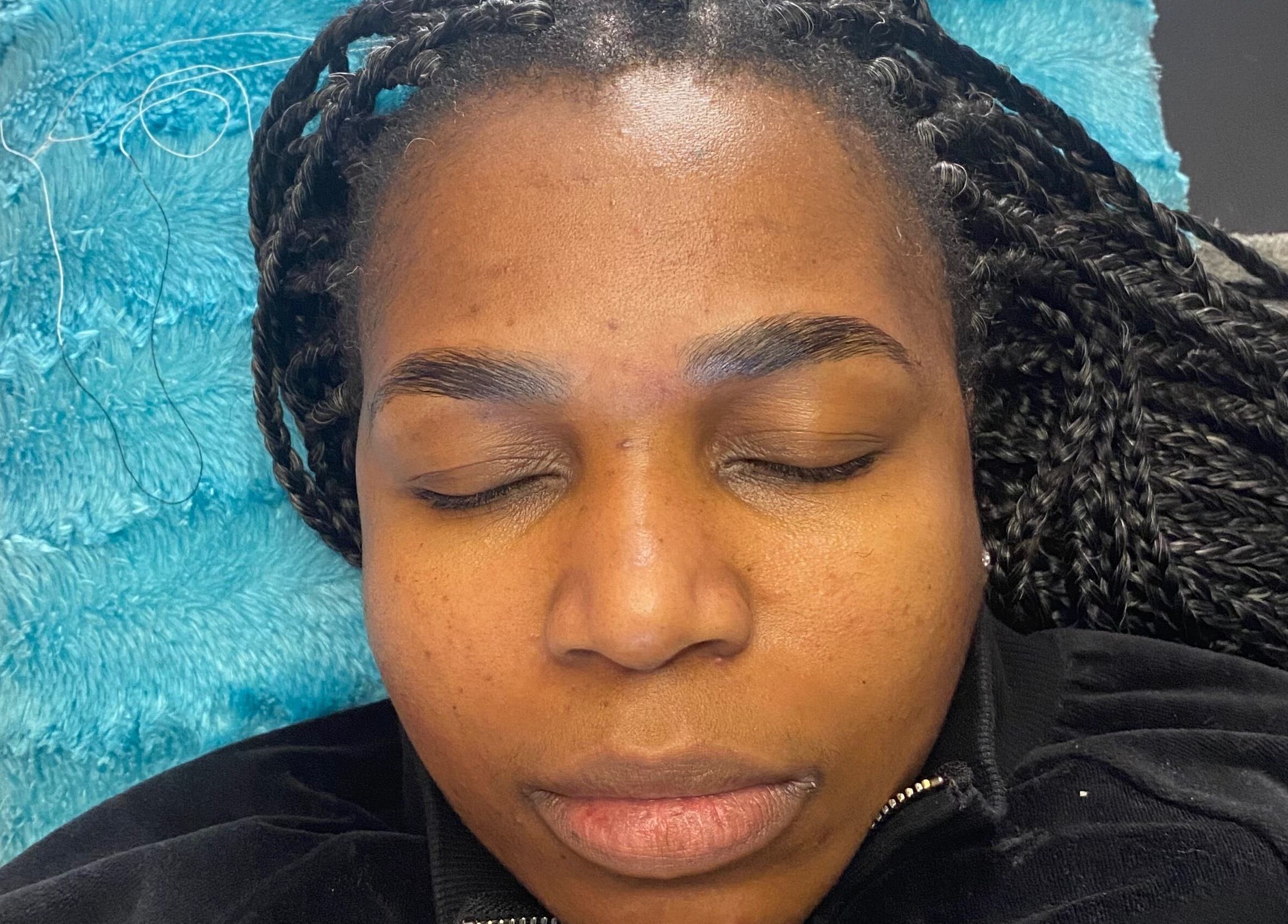 Client with groomed brows at Browed by Pat in Johannesburg, Gauteng, ZA.