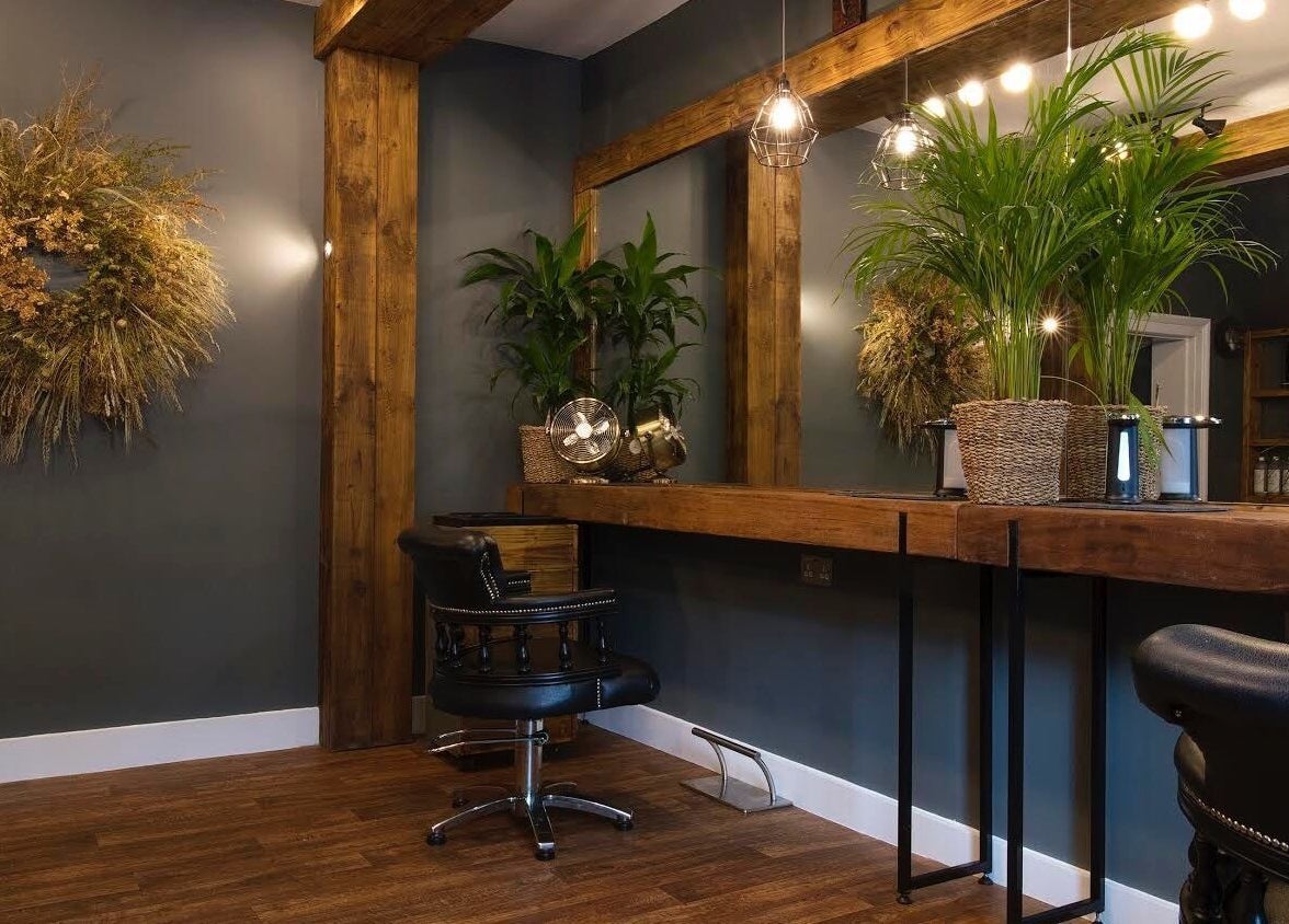 Karoliina Saunders_Hair salon in Highworth, England, GB with rustic decor and natural greenery.