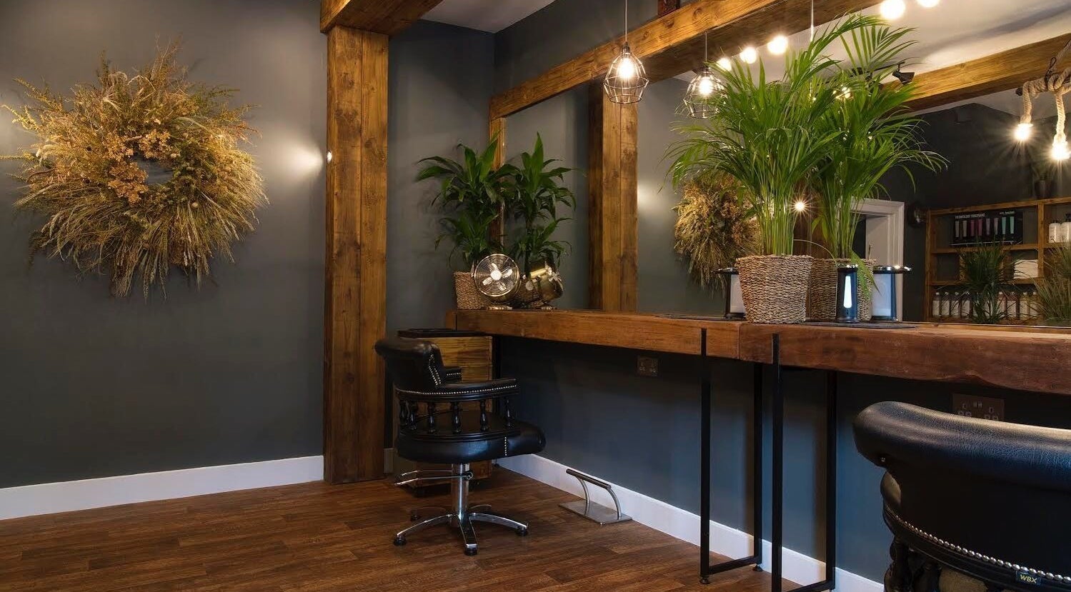 Karoliina Saunders_Hair salon in Highworth, England, GB with rustic decor and natural greenery.