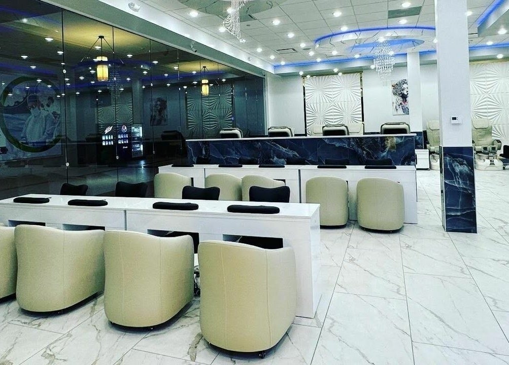 Luxurious interior of Creative Nail Spa in West Des Moines, Iowa, US, showcasing modern nail stations.