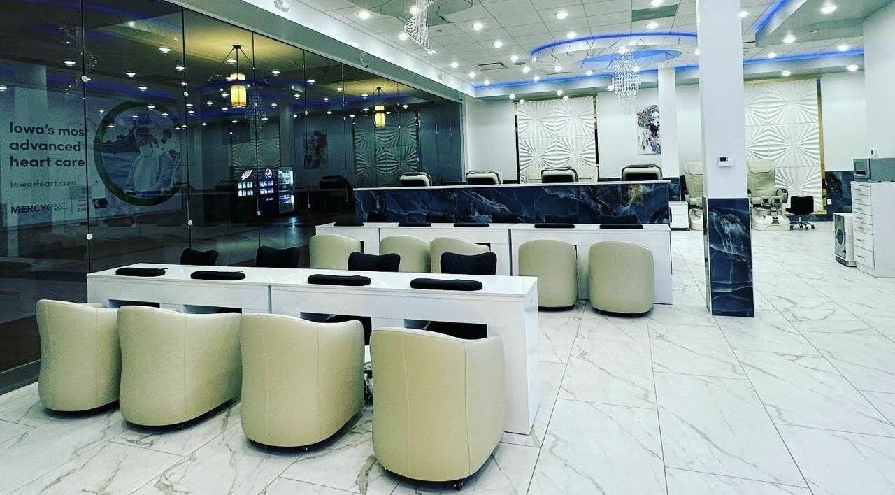 Luxurious interior of Creative Nail Spa in West Des Moines, Iowa, US, showcasing modern nail stations.