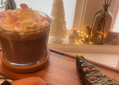 Hot chocolate with marshmallows at The Beauty Cottage in Almondbury, England, GB.