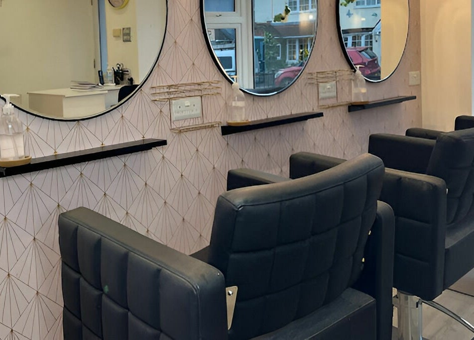 Modern styling chairs and mirrors at Salon at 8, Wroughton, England, GB, offering chic beauty services.