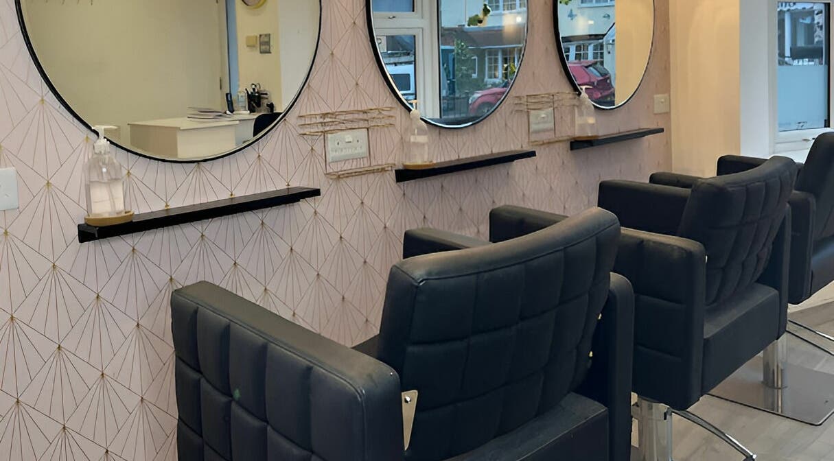 Modern styling chairs and mirrors at Salon at 8, Wroughton, England, GB, offering chic beauty services.