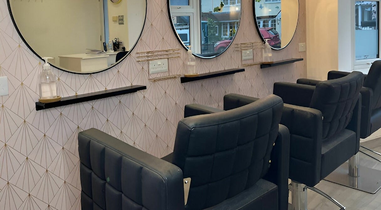 Modern styling chairs and mirrors at Salon at 8, Wroughton, England, GB, offering chic beauty services.