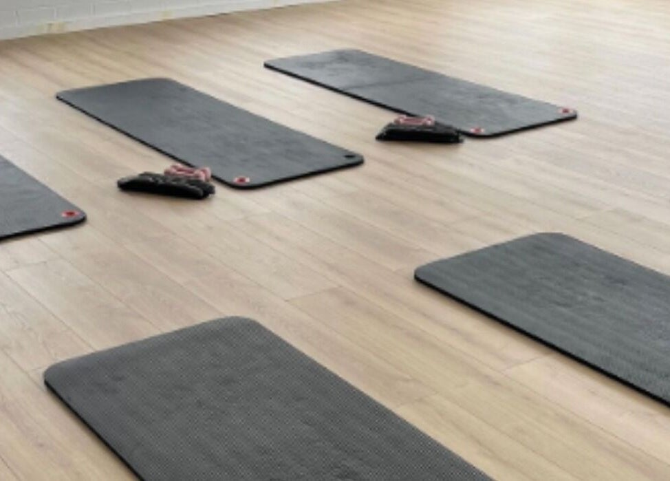Yoga mats neatly arranged at Bodhifit Studio & Wellness in Fyshwick, Australian Capital Territory, AU.