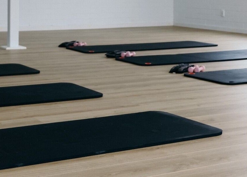 Yoga mats lined up at Bodhifit Studio & Wellness, Fyshwick, Australian Capital Territory, AU.