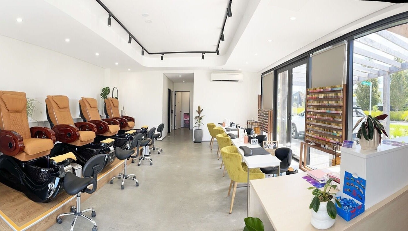 Bright and spacious interior of Bella Signature Nails, Auckland, Auckland, NZ featuring luxurious pedicure chairs.