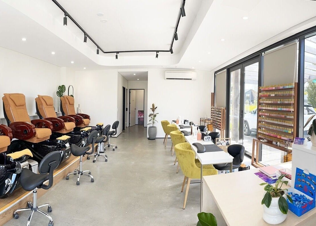 Bright and spacious interior of Bella Signature Nails, Auckland, Auckland, NZ featuring luxurious pedicure chairs.