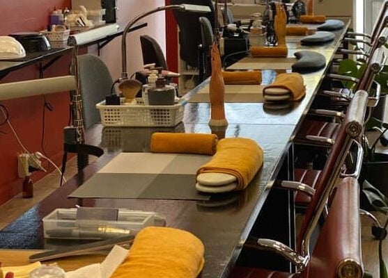 Modern nail salon setup at Bella Signature Nails, Auckland, NZ. Sleek chairs and tools create a welcoming atmosphere.