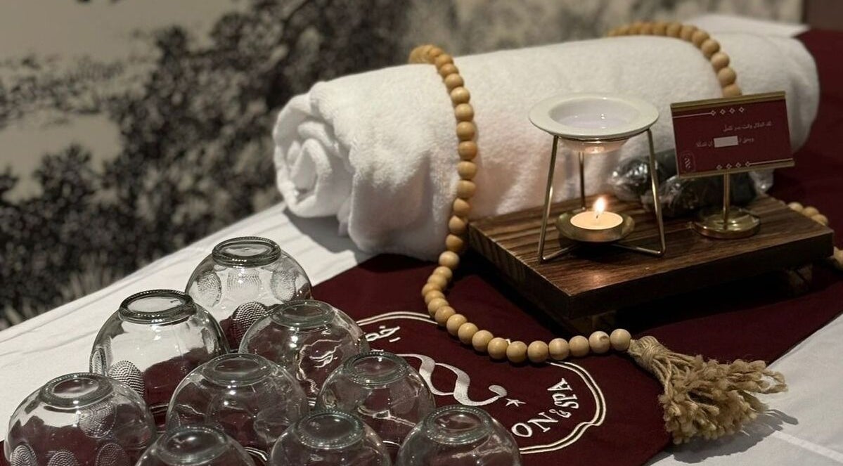 Relaxing spa setup with glass cups, candle, and towel at Ghumra I غمرة, Dhahran, Eastern Province, SA.