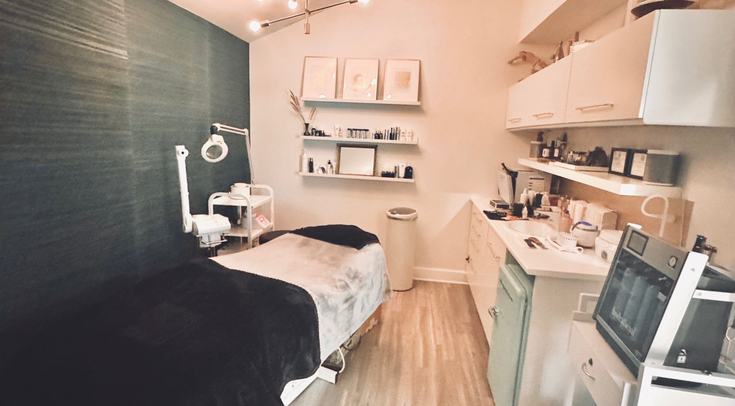 Treatment room at Jolie Skin Studio, Austin, Texas, US, featuring a modern, tranquil skincare setup.
