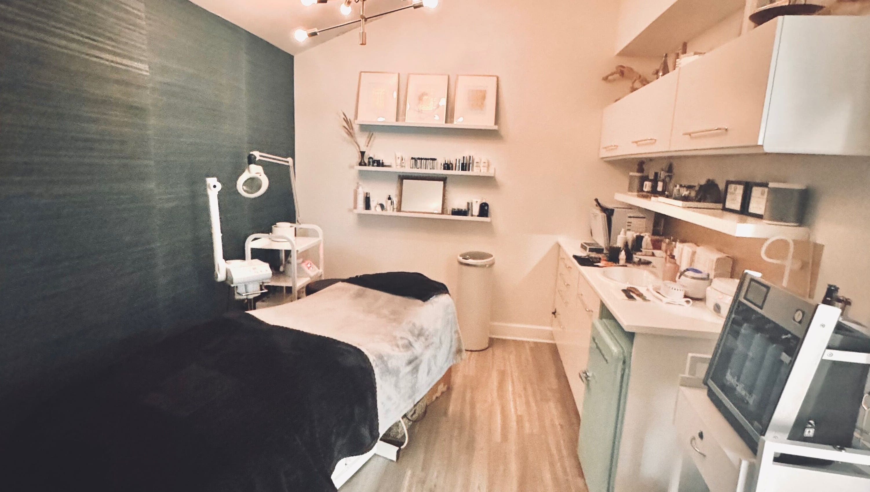 Elegant treatment room at Jolie Skin Studio in Austin, Texas, US, featuring modern spa amenities.