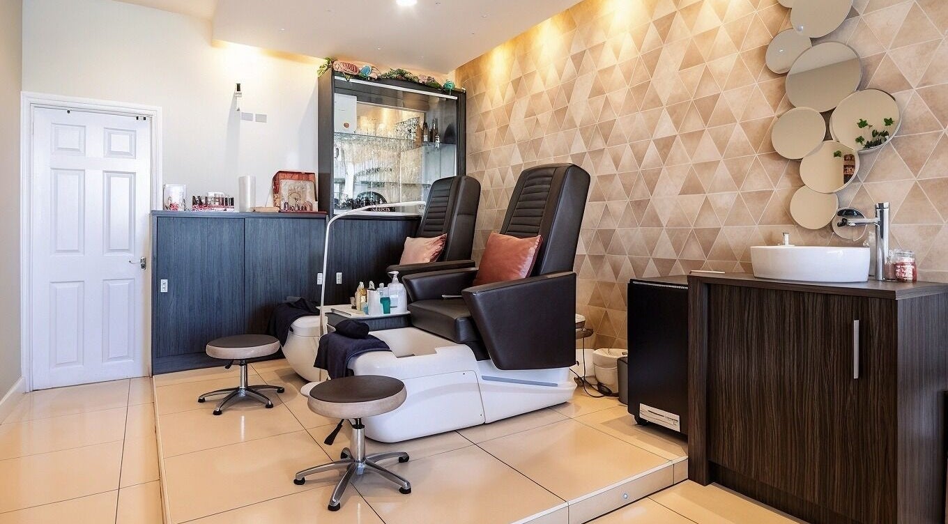 Luxurious pedicure chairs at Nail Bar London, Harrow, England, GB, blending comfort and elegance.